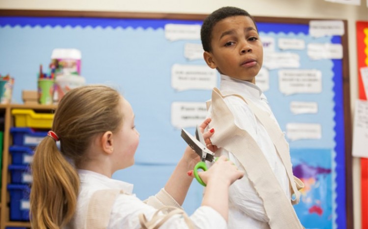 Pupils try their hand at costume making.